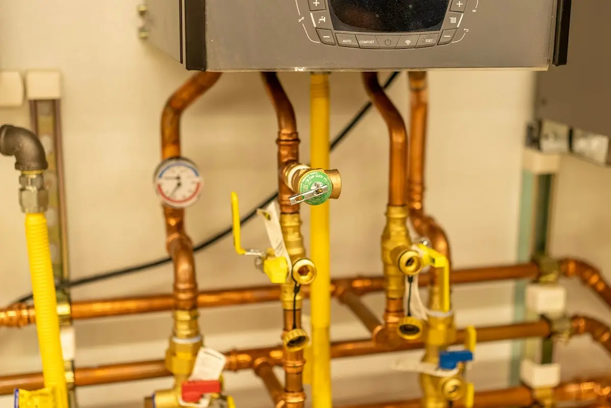 Licensed technician providing Backflow Prevention for a homeowner in Ossipee