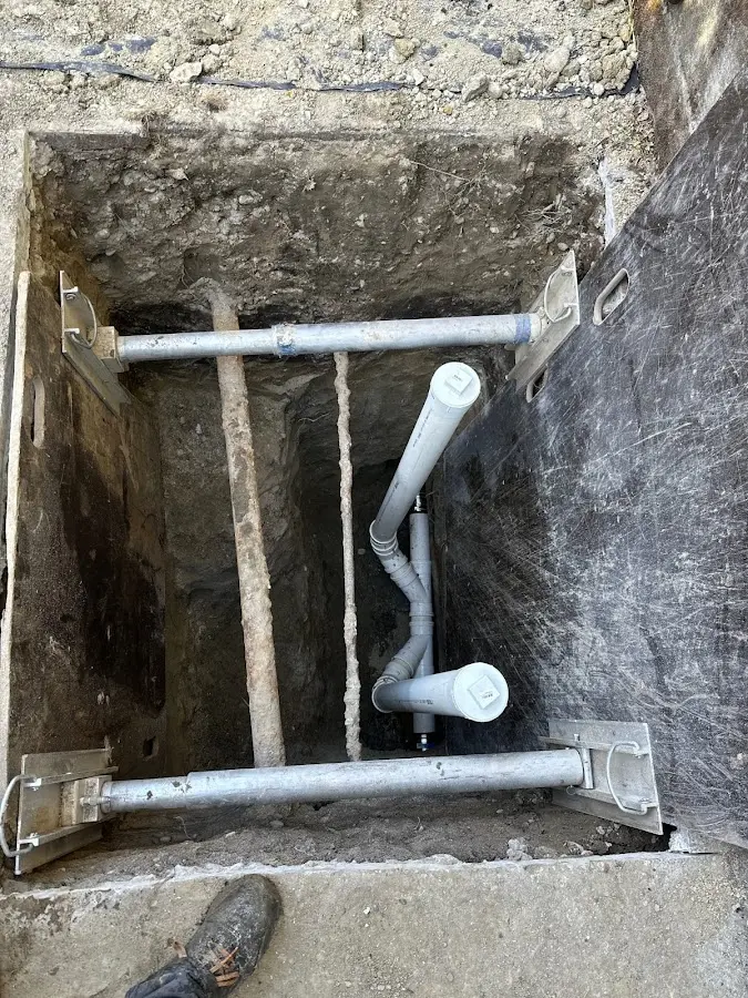 Experienced plumber completing Drain Cleaning work in Ossipee